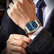 Laden Sie das Bild in den Galerie-Viewer, Elegante Uhr (Stahl/Gold  in klassischem Business‑Casual‑Stil mit markantem Tonneau‑Gehäuse
