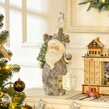 Laden Sie das Bild in den Galerie-Viewer, Weihnachtsdeko, Weihnachtsmann mit Tanne und Laterne, warme LED-Beleuchtung, Batteriebetrieb, In- und Outdoor, 55 cm